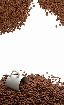 simsearch:400-03971684,k - close up of coffee beans and coffee cup on white background Fotografie stock - Microstock e Abbonamento, Codice: 400-04234459