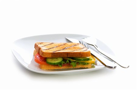 Toasted bread with filling isolated on the white Stock Photo - Budget Royalty-Free & Subscription, Code: 400-04234609