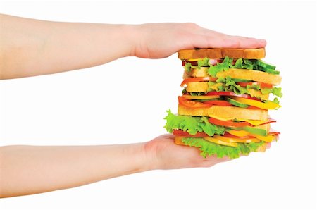 simsearch:400-07099478,k - Two hands holding sandwich isolated on white Stock Photo - Budget Royalty-Free & Subscription, Code: 400-04234646