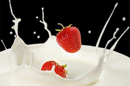 strawberries and milk splash on black background Stock Photo - Budget Royalty-Free & Subscription, Code: 400-04234666