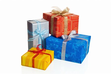 simsearch:400-05241626,k - Multi-coloured boxes with gifts, it is isolated on white Photographie de stock - Aubaine LD & Abonnement, Code: 400-04235128