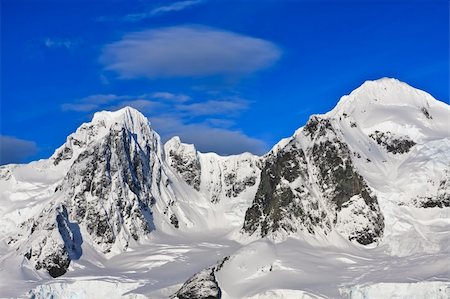 simsearch:400-04299207,k - Beautiful snow-capped mountains against the blue sky in Antarctica Stock Photo - Budget Royalty-Free & Subscription, Code: 400-04235120