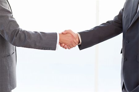 simsearch:400-04606211,k - close up of businessmen shaking their hands after a meeting at the office Stockbilder - Microstock & Abonnement, Bildnummer: 400-04235860