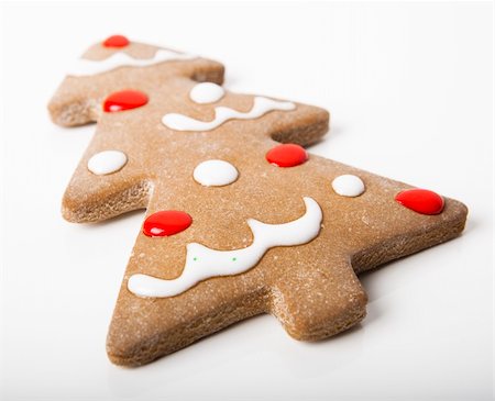 simsearch:400-05746007,k - Homemade Gingerbread christmas cookies with a shape of a tree isolated on white Stockbilder - Microstock & Abonnement, Bildnummer: 400-04236047