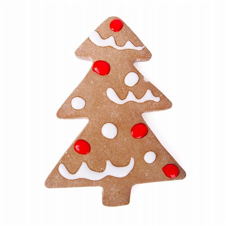 simsearch:400-05746007,k - Hausgemachte Lebkuchen Weihnachtsplätzchen mit einer Form eines Baumes isoliert auf weiss Stockbilder - Microstock & Abonnement, Bildnummer: 400-04236048