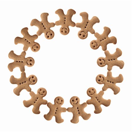 simsearch:400-05746007,k - Homemade Gingerbread man cookies isolated on white background Stockbilder - Microstock & Abonnement, Bildnummer: 400-04236052