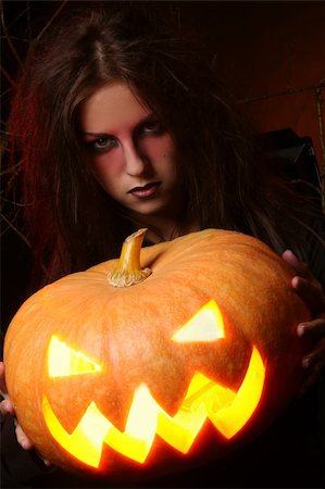 simsearch:400-04236303,k - a beautiful woman witha pumpkin in the hands Fotografie stock - Microstock e Abbonamento, Codice: 400-04236293