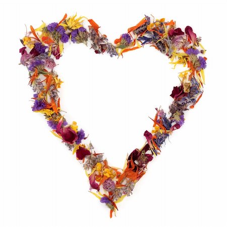 Heart shaped wreath of dried herb and flower petal mixture, over white background. Photographie de stock - Aubaine LD & Abonnement, Code: 400-04236349