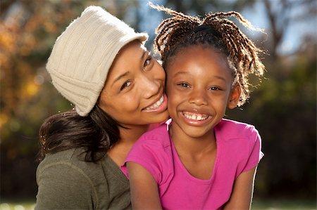 simsearch:400-04236555,k - African American mother and child having fun spending time together in a park Photographie de stock - Aubaine LD & Abonnement, Code: 400-04236555