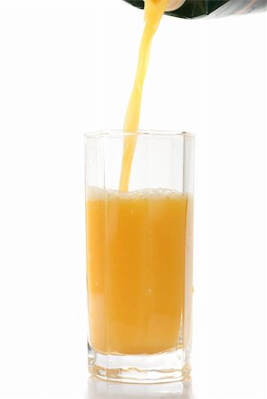 simsearch:6118-07351735,k - pouring orange juice with fruits isolated on a white background Stock Photo - Budget Royalty-Free & Subscription, Code: 400-04237106