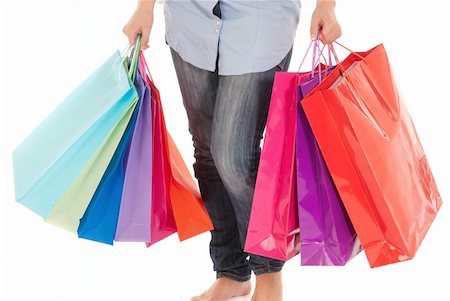 simsearch:400-07169053,k - Unrecognizable woman with shopping bags isolated on white background Stockbilder - Microstock & Abonnement, Bildnummer: 400-04237197