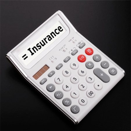 simsearch:400-04796133,k - insurance or risk concept with calculator showing financial security Stock Photo - Budget Royalty-Free & Subscription, Code: 400-04237543