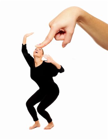 A picture of a big hand trying to press down a woman over white background Foto de stock - Super Valor sin royalties y Suscripción, Código: 400-04237855