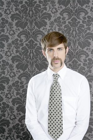 businessman retro mustache over gray wallpaper tie and shirt Stock Photo - Budget Royalty-Free & Subscription, Code: 400-04237910