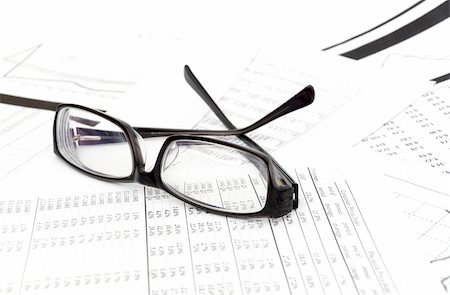 simsearch:400-06566764,k - Accounting. black glasses lies on stack document Fotografie stock - Microstock e Abbonamento, Codice: 400-04238006