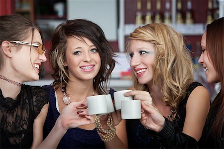 simsearch:400-04238163,k - Joyful young teens having a good time over coffee Stock Photo - Budget Royalty-Free & Subscription, Code: 400-04238163