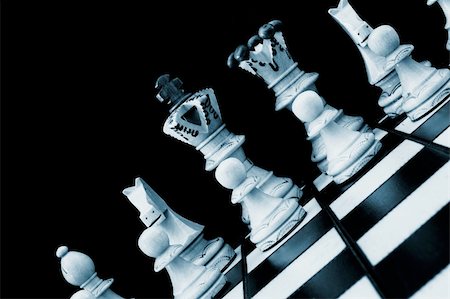 simsearch:400-04775983,k - chess pieces showing power competition conflict and strategy in business Stock Photo - Budget Royalty-Free & Subscription, Code: 400-04238228