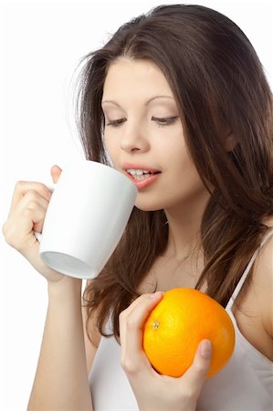 fat women seducing adults - Beautiful young woman holding an orange. Close up Stock Photo - Budget Royalty-Free & Subscription, Code: 400-04238697