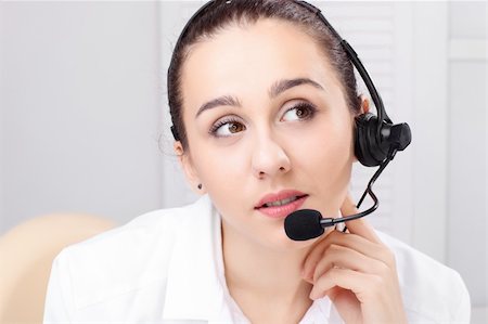 simsearch:400-03914864,k - woman with headset and close up shoot over white background Stock Photo - Budget Royalty-Free & Subscription, Code: 400-04238751
