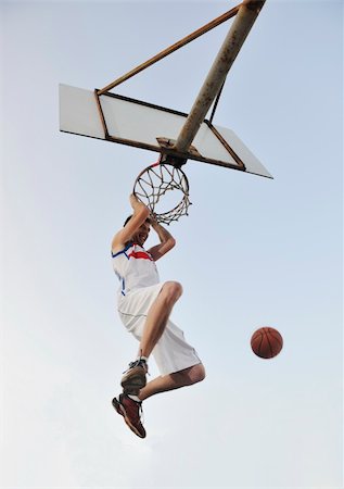 simsearch:400-04779709,k - basketball player practicing and posing for basketball and sports athlete concept Fotografie stock - Microstock e Abbonamento, Codice: 400-04239487