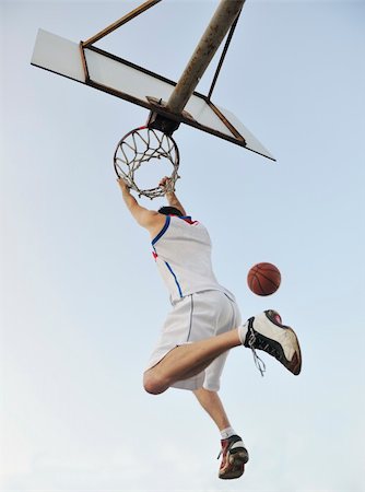 simsearch:400-04779709,k - basketball player practicing and posing for basketball and sports athlete concept Fotografie stock - Microstock e Abbonamento, Codice: 400-04239494