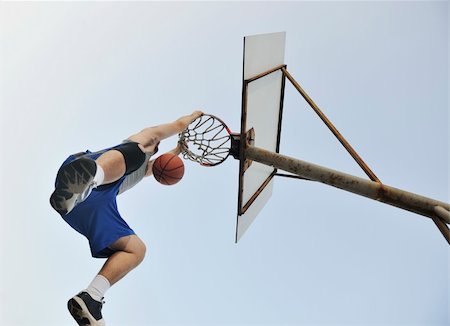 simsearch:400-04779709,k - basketball player practicing and posing for basketball and sports athlete concept Fotografie stock - Microstock e Abbonamento, Codice: 400-04239493