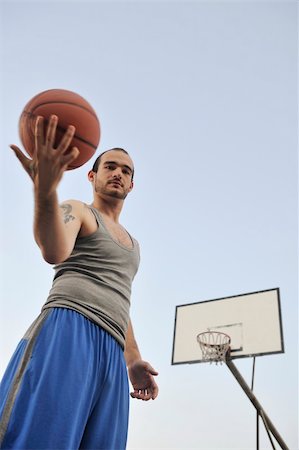 simsearch:400-07515585,k - basketball player practicing and posing for basketball and sports athlete concept Foto de stock - Royalty-Free Super Valor e Assinatura, Número: 400-04239514