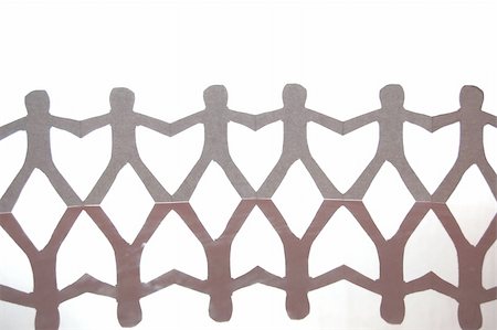 paper cutout chain - team of paper man showing concept of teamwork Stock Photo - Budget Royalty-Free & Subscription, Code: 400-04239882