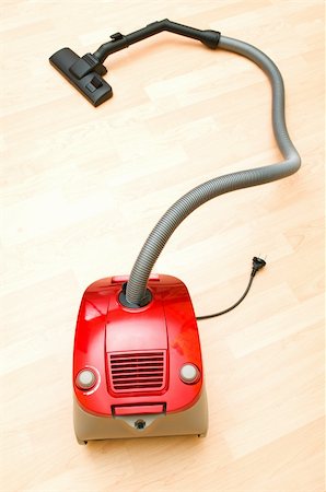 simsearch:400-05132204,k - Vacuum cleaner on the wooden floor Foto de stock - Super Valor sin royalties y Suscripción, Código: 400-04230225