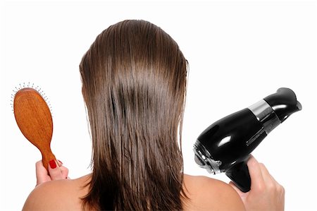 Picture of the back of a woman with long hair over white background with hair dryer and hairbrush Stock Photo - Budget Royalty-Free & Subscription, Code: 400-04230601