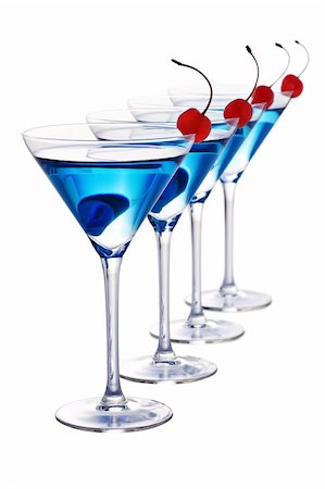 Four blue cocktail martini's with cherries isolated on white Fotografie stock - Microstock e Abbonamento, Codice: 400-04231073