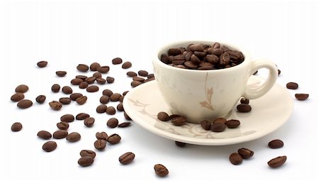 simsearch:400-04640830,k - Coffe beans in cup on coffee background Photographie de stock - Aubaine LD & Abonnement, Code: 400-04231262