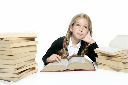 simsearch:400-04131892,k - little thinking student blond braided girl with glasses smiling stacked books on white background Stockbilder - Microstock & Abonnement, Bildnummer: 400-04231369