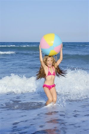 simsearch:400-04596901,k - Beach little girl colorful ball vacation playing in blue sea Stock Photo - Budget Royalty-Free & Subscription, Code: 400-04231372