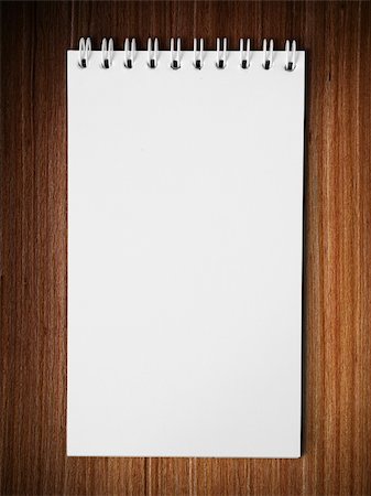 plain wallpaper - Long blank white note book vertical on wood table background Stock Photo - Budget Royalty-Free & Subscription, Code: 400-04231772