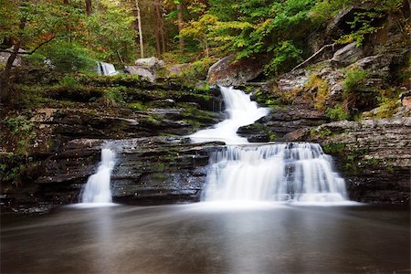 Waterfall with trees and rocks in mountain in Autumn. From Pennsylvania Dingmans Falls. Stock Photo - Budget Royalty-Free & Subscription, Code: 400-04231854