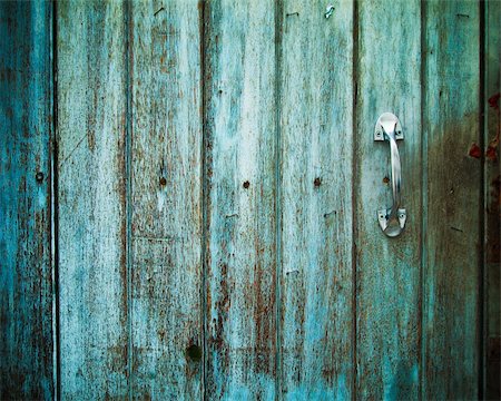 Old Door handle with an old wood door painted with green color Stock Photo - Budget Royalty-Free & Subscription, Code: 400-04232263