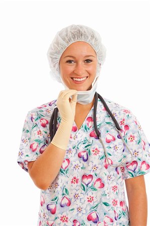 doctor with cap and mask - Portrait of young woman nurse in scrubs pulling on mask Stock Photo - Budget Royalty-Free & Subscription, Code: 400-04232454
