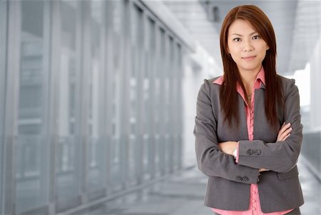 Young attractive business woman in corridor of modern building in outdoor. Stock Photo - Budget Royalty-Free & Subscription, Code: 400-04232958