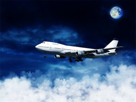 person in aerospace - Airplane above the clouds Stock Photo - Budget Royalty-Free & Subscription, Code: 400-04233115