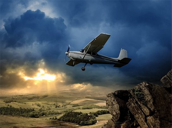 Airplane above the clouds Photographie de stock - Libre de Droits (LD), Artiste: hussainkin, Le code de l’image : 400-04233121