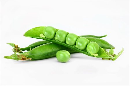 Green Peas with white background Fotografie stock - Microstock e Abbonamento, Codice: 400-04233397