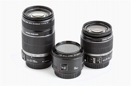 simsearch:400-06630396,k - A set of three lenses for DSLR camera on a white background Foto de stock - Super Valor sin royalties y Suscripción, Código: 400-04233421