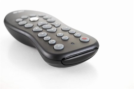 simsearch:400-05223721,k - Tv remote with reflection on white background Foto de stock - Royalty-Free Super Valor e Assinatura, Número: 400-04233583