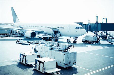 airplane is waiting for departure in pudong airport shanghai china. Stock Photo - Budget Royalty-Free & Subscription, Code: 400-04233674
