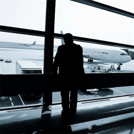 simsearch:400-08503492,k - the business man at the airport. Stock Photo - Budget Royalty-Free & Subscription, Code: 400-04233675