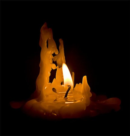 candle on a black background Stock Photo - Budget Royalty-Free & Subscription, Code: 400-04240226