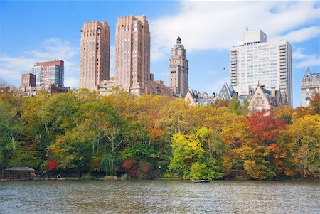 New York City Central Park in Autumn with Manhattan skyscrapers and colorful trees over lake with reflection. Stock Photo - Budget Royalty-Free & Subscription, Code: 400-04240606