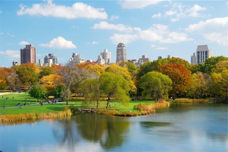 New York City Central Park in Autumn with Manhattan skyscrapers and colorful trees over lake with reflection. Stock Photo - Budget Royalty-Free & Subscription, Code: 400-04240607