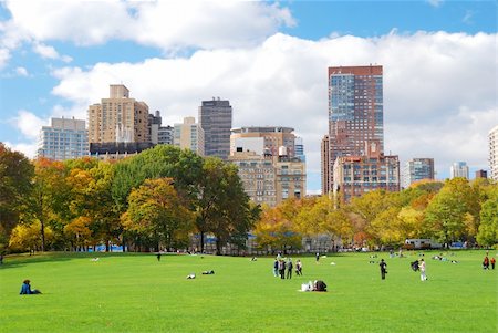 simsearch:400-08813469,k - New York City Manhattan skyline panorama viewed from Central Park with cloud and blue sky and people in lawn. Stock Photo - Budget Royalty-Free & Subscription, Code: 400-04240608